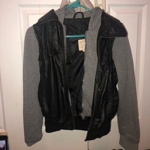 Leather jacket with sweatshirt attached
